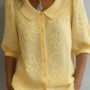 Sara – Bluse med broderte blomster
